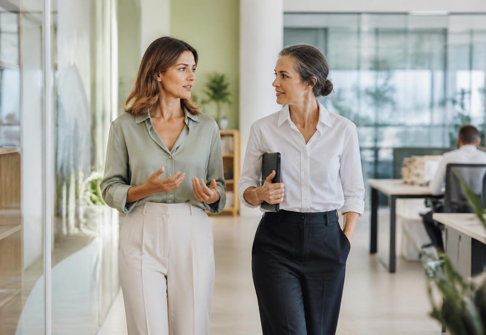 Two professionals discussing career development